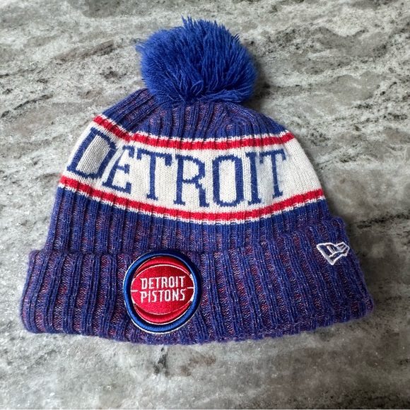 New Era Detroit Pistons Blue and Red Pom Beanie - Picture 1 of 9